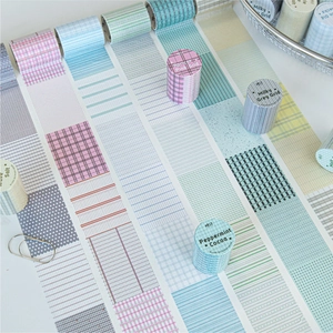 Minimalist grid pattern washi tape rolls in various pastel colors for bullet journaling