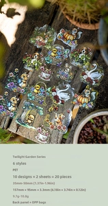 Detailed view of Twilight Garden animal stickers on rustic wood for scrapbooking