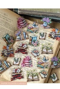 Detail of vintage flower PET stickers featuring roses and hydrangeas on aged book pages