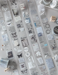 Detail of vintage PET tape with butterflies, flowers and calligraphy for journaling
