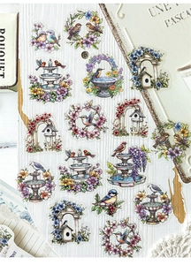 Macro view of floral PET stickers with bird and garden motifs for DIY journaling