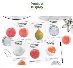 Detailed view of PaperMore assorted sticky notes including fruit and shell designs