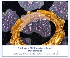 Detailed view of semi-transparent glitter fireworks stickers in a vintage gold frame
