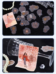 Detail of semi-transparent firework stickers and a girl decorative card in a lifestyle setting