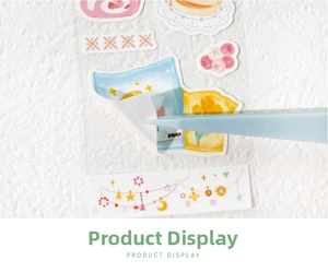 Detail of glitter PET fairy tale stickers being peeled with a precision craft tool
