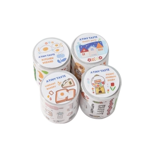 Four rolls of pastel dessert themed washi tape with cute decorative labels for scrapbooking