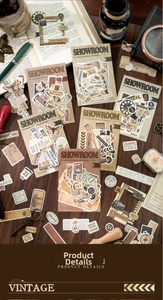 Detailed close-up of vintage collage stickers with retro butterfly and stamp motifs