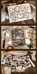 Detail of vintage scrapbook stickers featuring old stamps and butterfly motifs in brown tones
