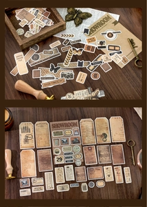 Macro detail of vintage scrapbook stickers with retro labels and stamps on dark wood