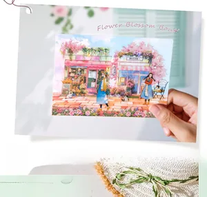 Close-up of a watercolor flower shop sticker showing a girl and a cat in soft pastel tones