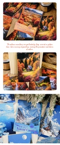 Détails de cartes de scrapbooking à thème paysage sur un bureau en bois rustique
