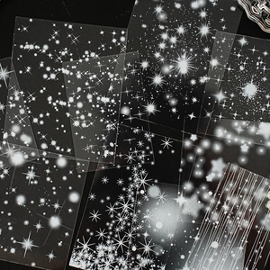 Nature themed white PET decorative stickers with stars and light rays on black background