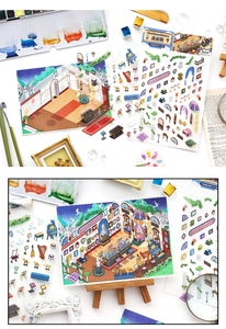 Detailed macro view of art gallery themed scrapbooking stickers with easels and paintings