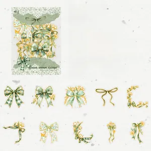 Gros plan d'autocollants marguerites vertes avec dorure laser 3D pour scrapbooking