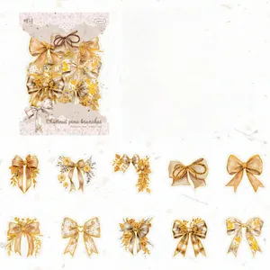 Détails des autocollants nœuds en PET avec effets laser dorés pour scrapbooking