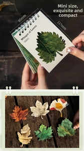 Detail of leaf-shaped white kraft stickers with size measurements and wood background