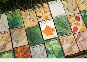 Macro detail of Whisper of Leaves spiral notebooks with realistic leaf vein textures