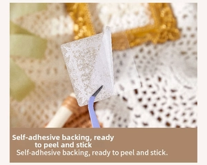 Detail of vintage PET decorative stickers with tweezers for DIY scrapbooking craft