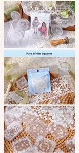 Macro detail of white PET lace stickers with floral patterns for vintage scrapbooking art