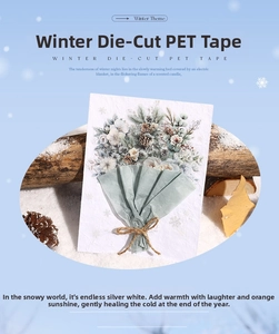 Detailed macro of winter theme die-cut PET tape featuring pine cones and white flowers