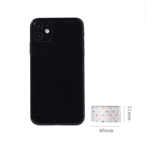 Detailed view of colorful polka dot PET tape showing 21mm width and 40mm diameter size