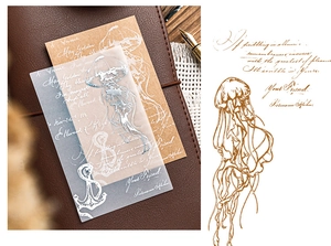 Detail of vintage jellyfish stickers with translucent paper on leather notebook