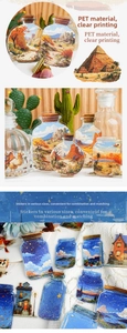 Macro detail of decorative PET bottle stickers with landscape illustrations for journaling