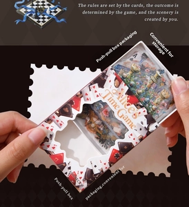 Macro shot of 100pcs Alice's Time Game scrapbooking stickers in a slide-out box