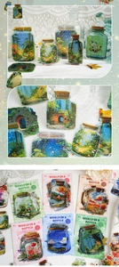 Macro detail of PET decorative stickers featuring creative bottle landscape art designs