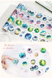 Macro view of transparent PET bubble stickers showing fantasy castle and aurora landscapes
