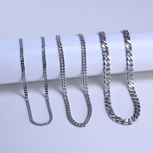 Detailed comparison of three different widths of 925 silver Cuban link chains on a display
