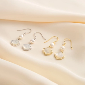 Elegant 14K gold and silver drop earrings with natural mother of pearl shell pendants