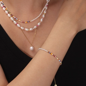 Colorful seed bead and pearl layered necklace set for women with golden pendant detail