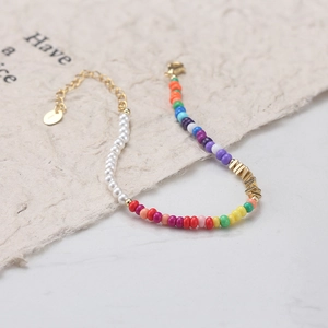 925 silver beaded bracelet featuring white pearls and colorful glass beads with gold accents
