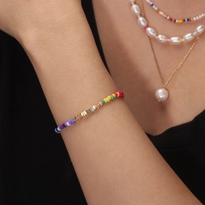 Colorful 925 sterling silver beaded bracelet with gold rectangular metal accents