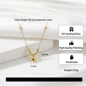 Elegant 925 sterling silver heart pendant necklace with gold plating and decorative beads