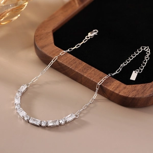Detailed close-up of S925 sterling silver bracelet with baguette-cut cubic zirconia