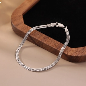 Detail of S925 sterling silver triple flat weave bracelet with lobster clasp and S925 hallmark