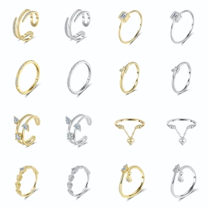 Selection of S925 sterling silver and gold rings with 5A zircon in a matrix display