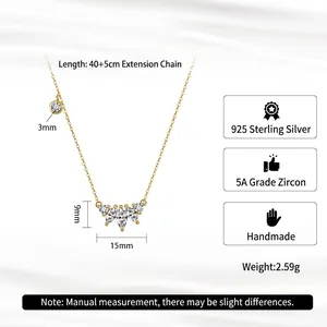 S925 sterling silver gold necklace with marquise zircon pendant on silk background
