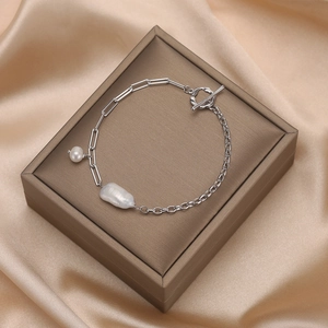 Baroque pearl S925 sterling silver chain bracelet with OT toggle clasp on jewelry box