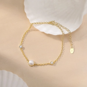 Minimalist S925 gold plated silver bracelet with freshwater pearl and clear cubic zirconia
