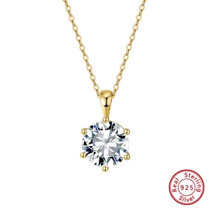 Macro detail of the classic six-prong setting on a gold 925 sterling silver crown necklace