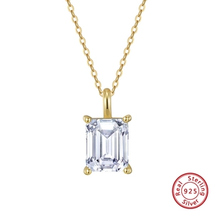 Macro detail of S925 sterling silver necklace with emerald cut clear cubic zirconia