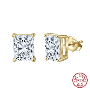 Macro shot of 925 sterling silver gold plated square radiant cut zircon stud earrings