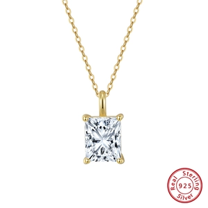 Close-up of 925 sterling silver gold necklace with a square-cut zirconia pendant