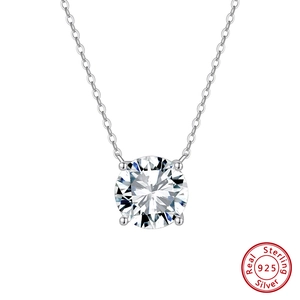 Detail of a sparkling round-cut zircon pendant on a 925 sterling silver O-chain necklace