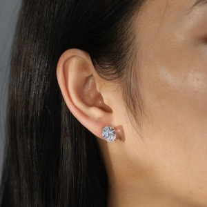 Macro view of oval cut cubic zirconia stud earrings with elegant four-prong setting