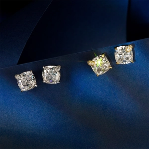 Square cushion cut cubic zirconia stud earrings with leaf detail in silver and gold finish