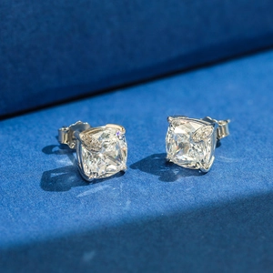 Elegant S925 sterling silver square-cut zircon stud earrings on a blue textured surface